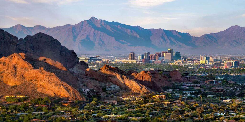 Phoenix Arizona Skyline with red rock mountains in the distance